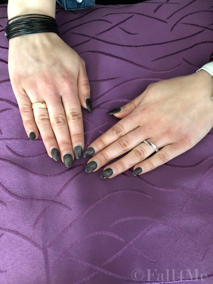 A ray of light on a black background seems like starlight on nails