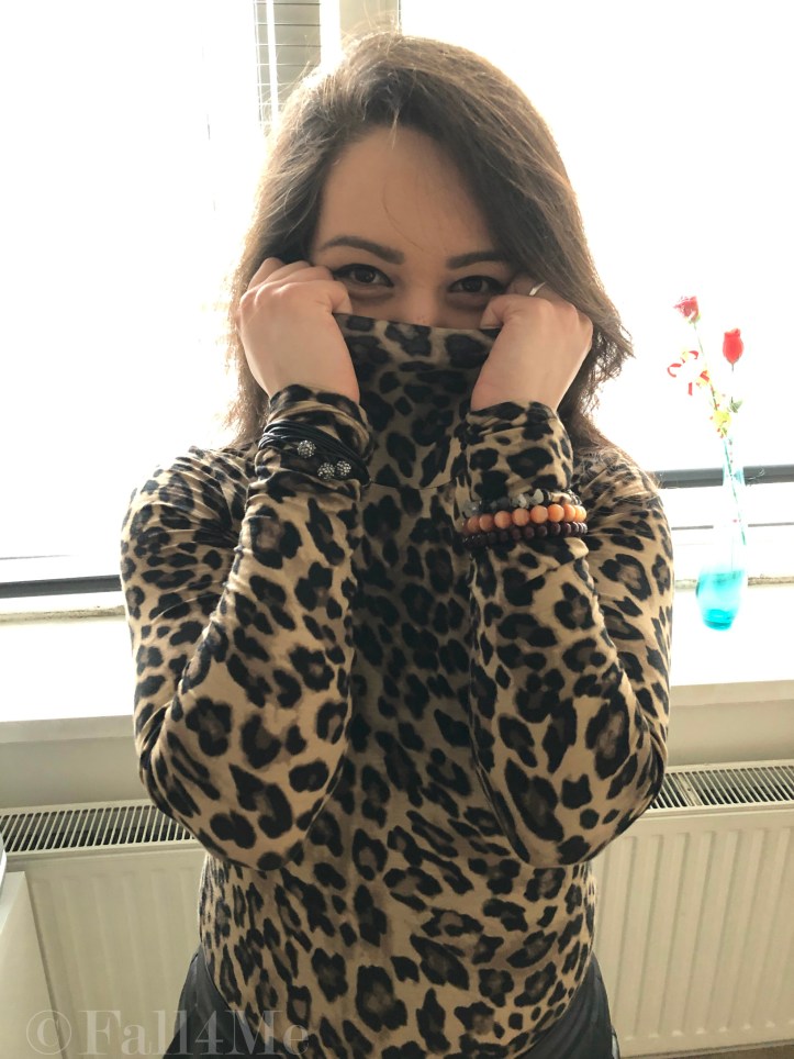 Leo print turtle neck combined with leather