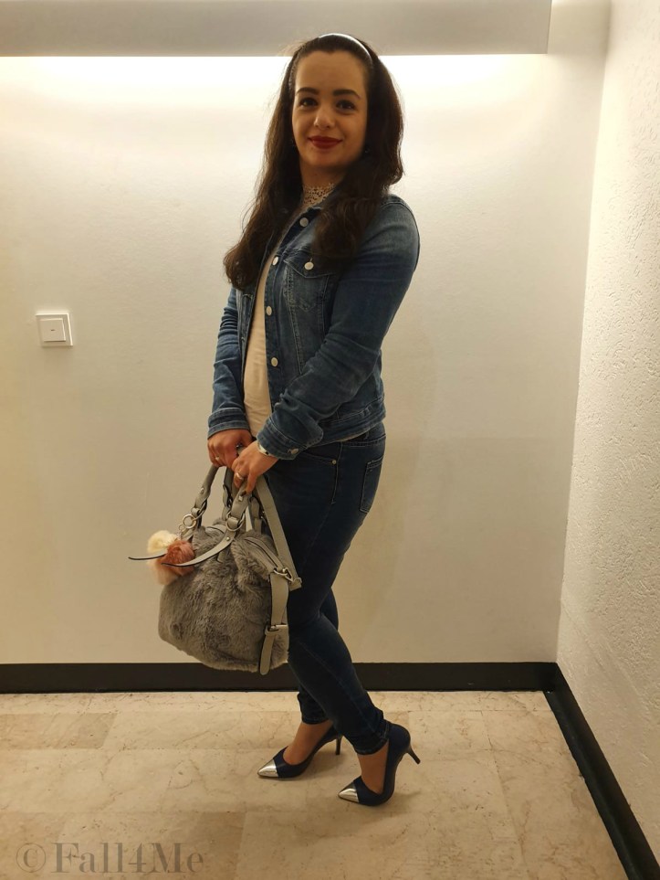 Denim on denim in different shades with silver, light grey and red lips