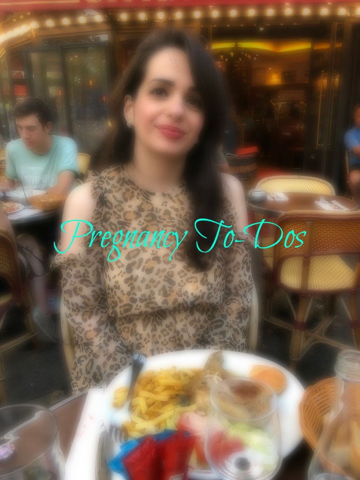 Pregnant woman eating french fries and chicken