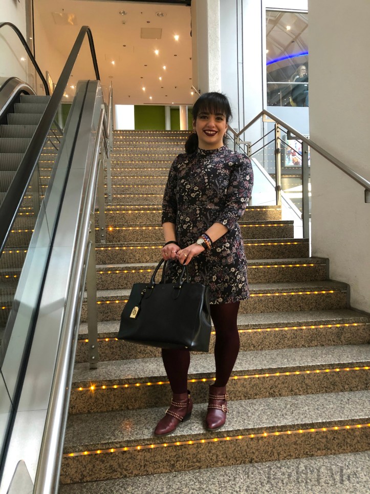 Burgundy is back for autumn with flowers and leather accessories.