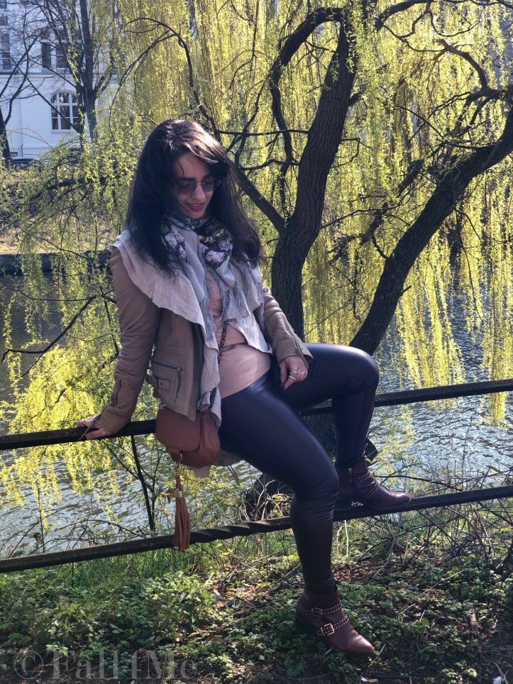 Lavender accents worn with non-black leather-optics and beige powder-shades.