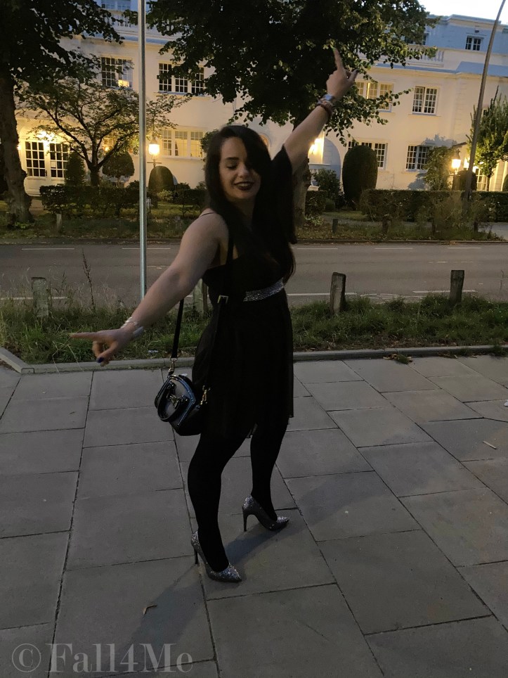 A brown asymmetric disco dress in chiffon combined with silver glitter.