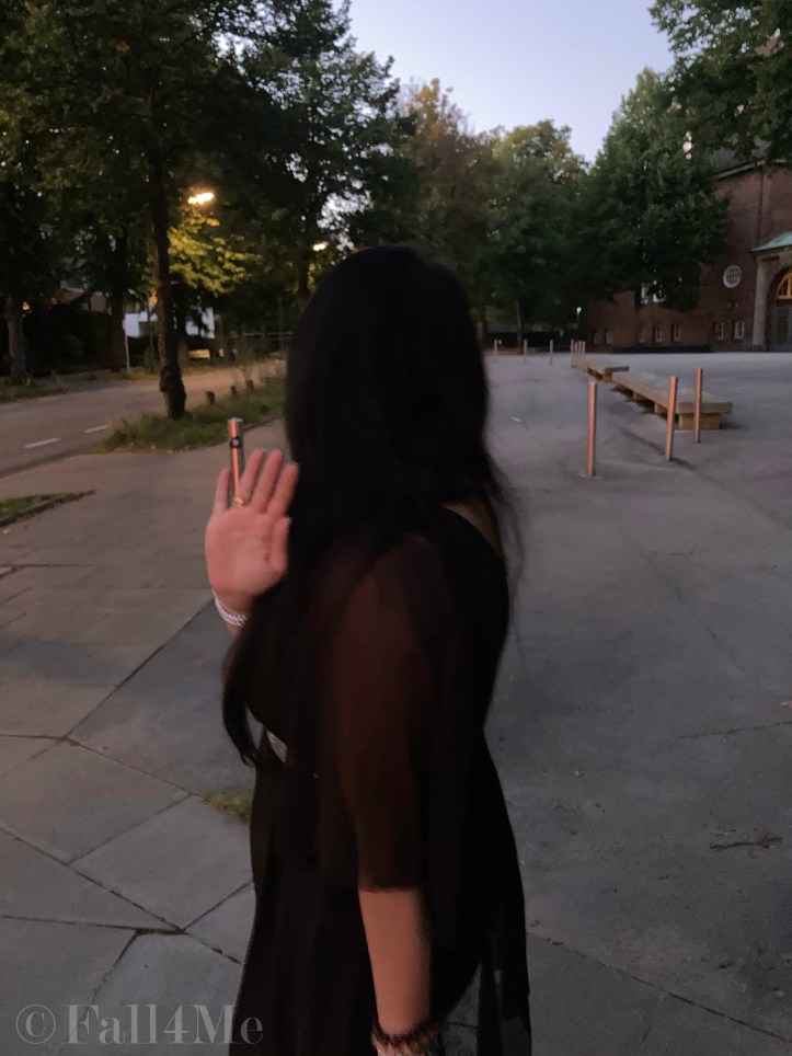 A brown asymmetric disco dress in chiffon combined with silver glitter.