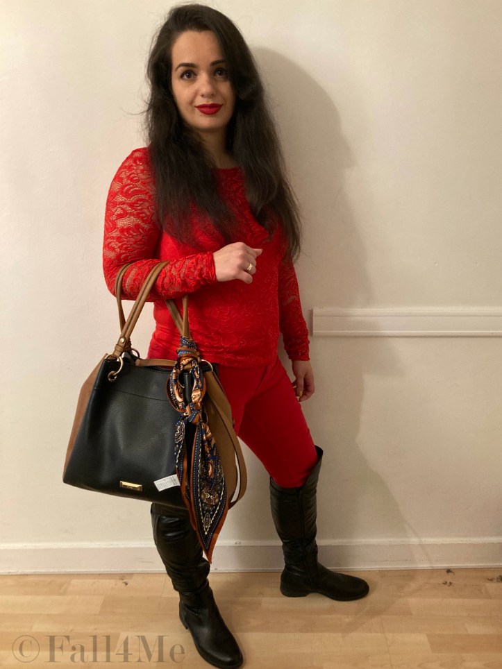 Red 100 per cent from head to toe with accessories in black (or white).