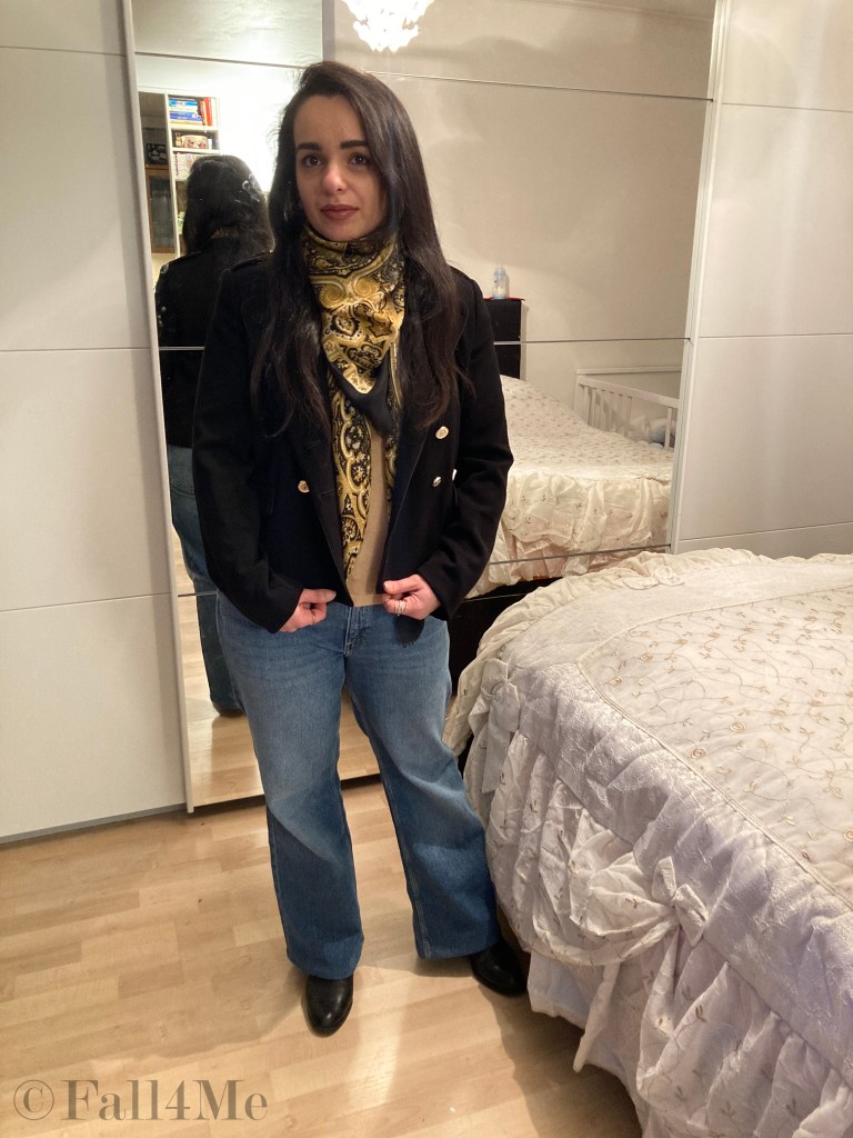 Celebrating soft retro with flared jeans, paisley pattern, shoulder pads and double breasted buttons in soft shades.