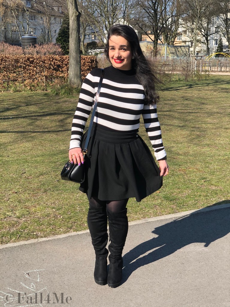 Black and white worn with a red accent and block heels.