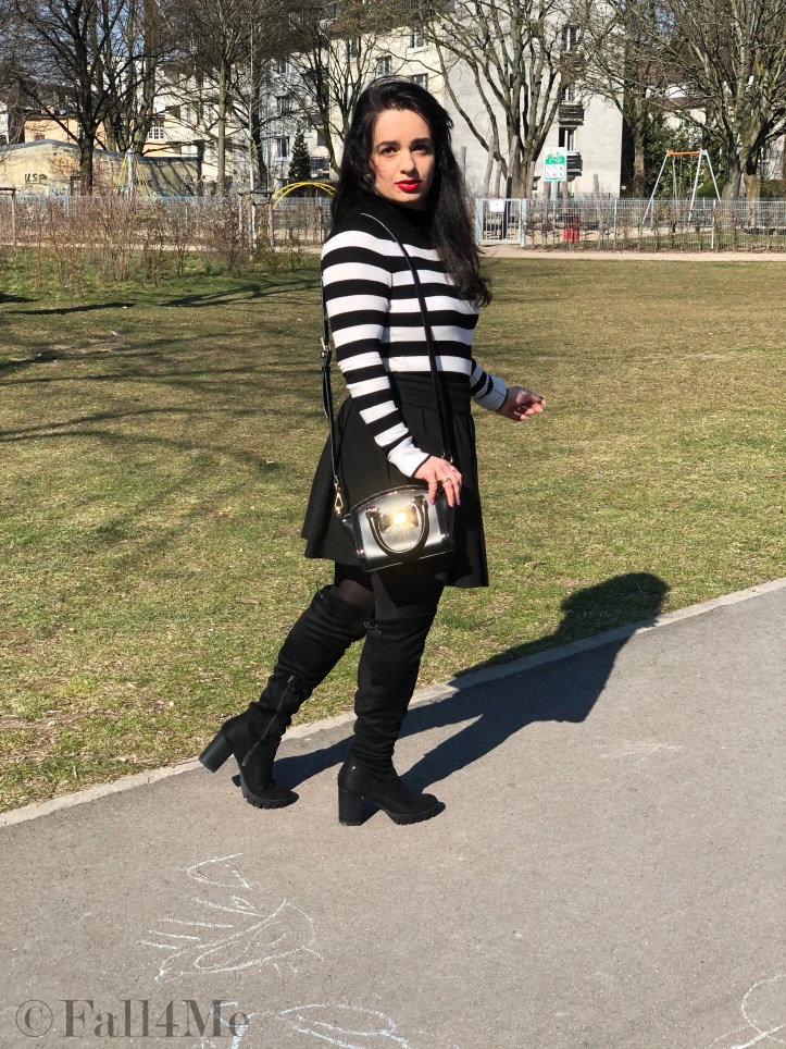 Black and white worn with a red accent and block heels.