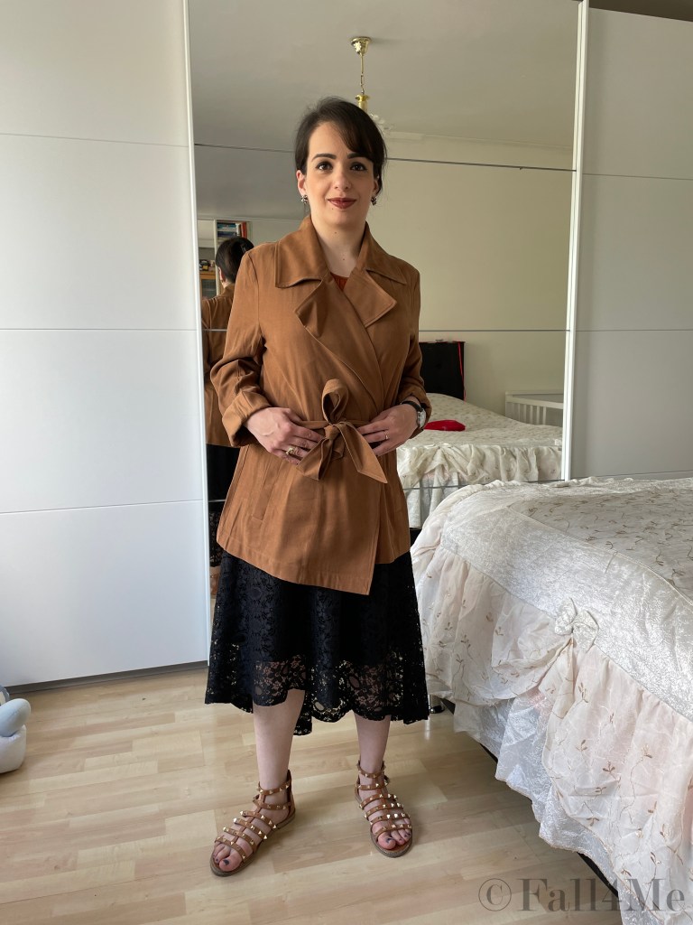 The hot trend for cool days: A summer trench with a flared skirt and sandals.