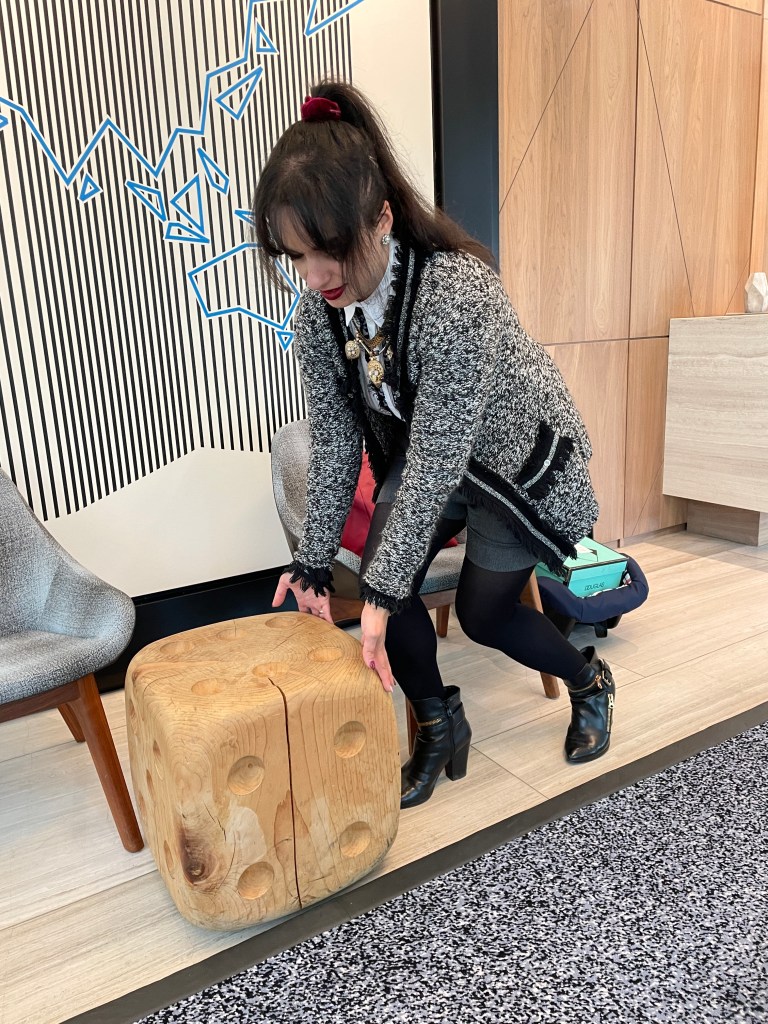 A style a la Chanel combined with wide bermudas.