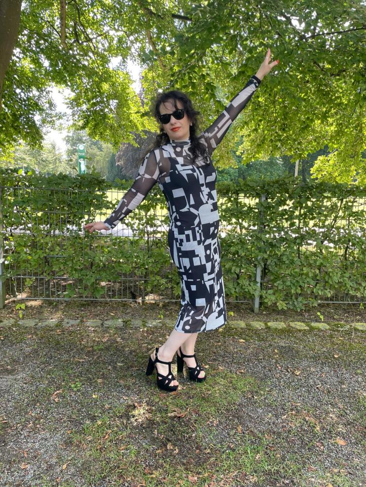 A maxi-dress with two layers styled in the upper eastside chic.