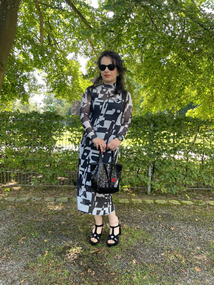 A maxi-dress with two layers styled in the upper eastside chic.