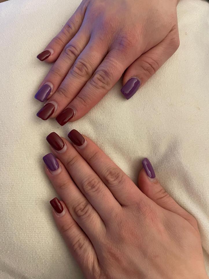 Easter nail-art in burgundy and purple.