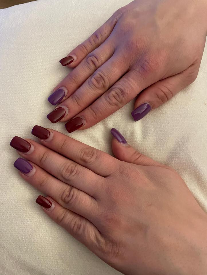 Easter nail-art in burgundy and purple.