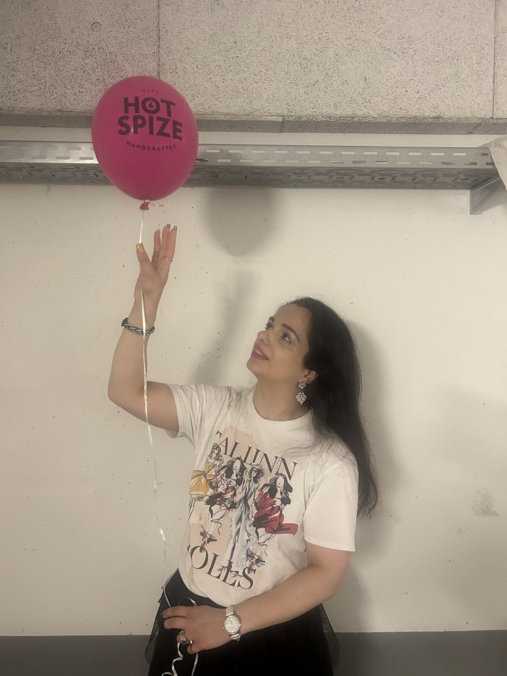 Upper Eastside chic with artful print t-shirt and a black tulle skirt.