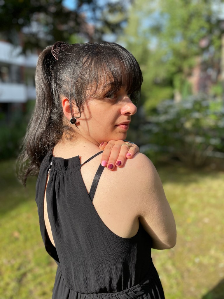 A summer maxi-dress in black.