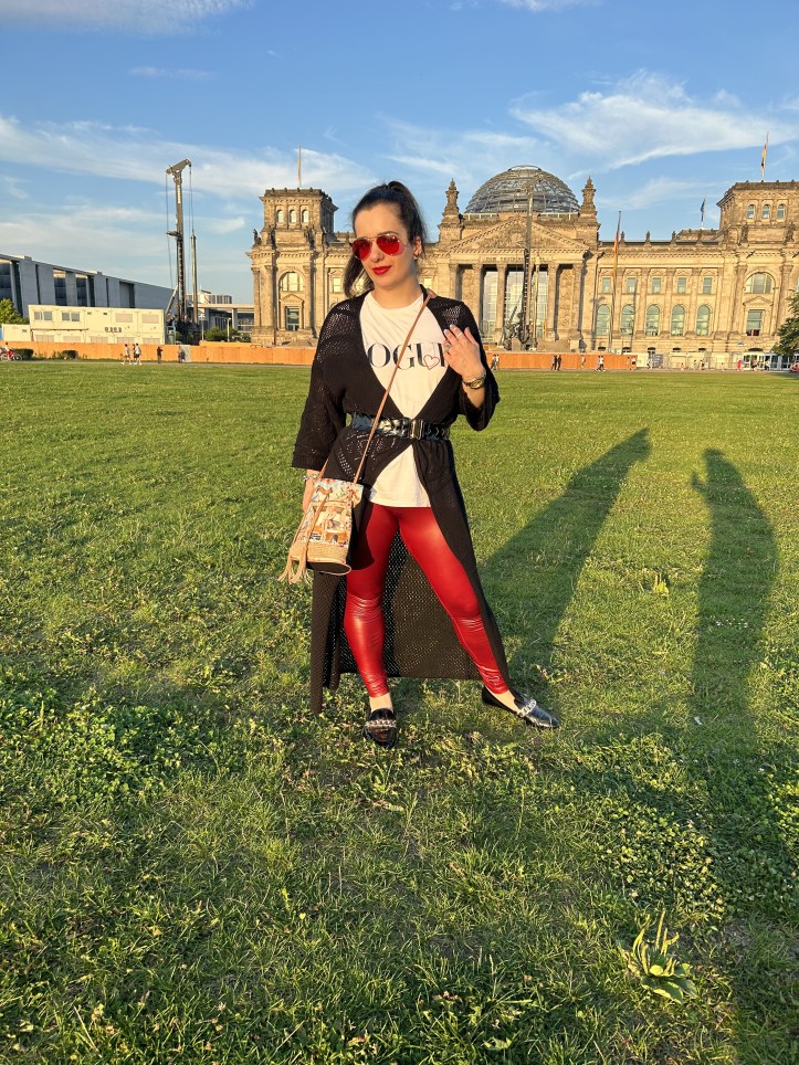 T-shirts with a message worn with a coarse-knit cardigan.