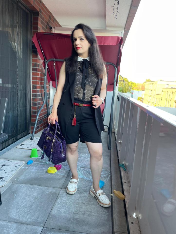 The Upper Eastside chic #4 provides the suit-vest and shorts.